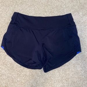 Navy blue lululemon speed up 2.5 shorts size 4